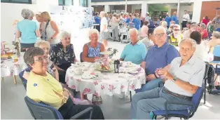  ??  ?? Former NHS staff enjoy reminiscin­g at the vintage tea party in Forth Valley Royal Hospital