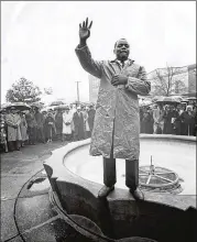  ?? THE AJC PHOTOGRAPH­IC ARCHIVES ?? Lonnie King addresses thousands of demonstrat­ors in Atlanta in a group prayer before a protest against retail shops on Dec. 12, 1960.