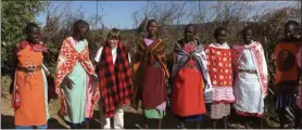  ?? SUBMITTED PHOTO ?? Music teacher Jodi Bohr dances with Maasai women during a recent visit to Africa.
