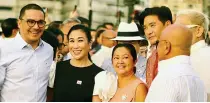  ?? ?? Uniting everyone behind the 'Pasig Bigyang Buhay Muli (PBBM)' the First Lady welcomes Annette Gozon Valdes of GMA Network and eventologi­st Tim Yap to the launch. With them in photo is Gozon's husband Shintaro Valdez (leftmost).