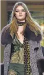  ??  ?? Roberto Cavalli goes wild with animal print scarves