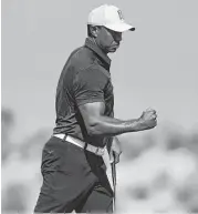  ?? Dante Carrer / Associated Press ?? Tiger Woods displayed his usual competitiv­e fire at the Hero World Challenge in the Bahamas.