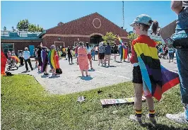  ?? JULIE JOCSAK TORSTAR FILE PHOTO ?? Protesters gathered at West Lincoln township hall in June following comments from Mayor David Bylsma they described as homophobic and racist. Township council voted to reprimand the mayor and order him to undergo sensitivit­y training.