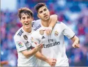  ?? GETTY IMAGES ?? Marco Asensio (right) celebrates a goal on Thursday.