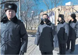  ?? GREG BAKER AFP/GETTY IMAGES ?? Security has been stepped up outside the Canadian Embassy in Beijing since Meng Wanzhou, CFO of Huawei, was arrested in Canada.