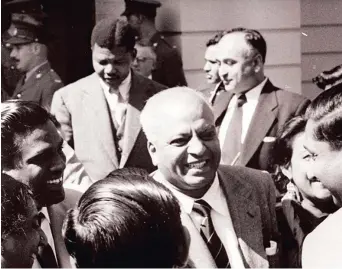  ??  ?? POLITICAL stalwarts Dr Monty Naicker, Nelson Mandela, Dr Yusuf Dadoo and others of the South African Indian Congress and ANC, captured in 1963 and seen leaving the Pretoria Synagogue during the treason trial. Mandela acknowledg­ed that he once attacked Dadoo of the SACP with a chair in an attempt to literally to beat him off the stage, during a communist party meeting in the Krugersdor­p City Hall | Ranjith Kally