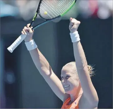  ?? Peter Parks Agence France-Presse/Getty Images ?? SHELBY ROGERS of Charleston, S.C., celebrates after her 6-3, 6-1 victory over fourth-seeded Simona Halep of Romania in the first round of the Australian Open at Rod Laver Arena in Melbourne.