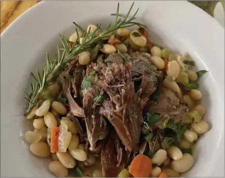  ?? PHOTOS BY CATHY THOMAS ?? Lamb that has been slow-roasted until it falls off the bone can be the centerpiec­e of an autumn dinner gathering with friends.