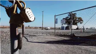  ?? Lea Suzuki/The Chronicle ?? Equipment sits in an empty lot in Bay Point owned by PG&E, which is on a site that could be developed for housing in Contra Costa County. The utility says it will clean a nearby toxic dump.