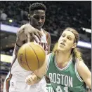  ?? MORRY GASH
/ ASSOCIATED ?? Milwaukee’s Johnny O’Bryant III and Boston’s Kelly Olynyk go after a loose ball during the Celtics’ 105100 victory in Milwaukee. Olynyk finished with 16 points.