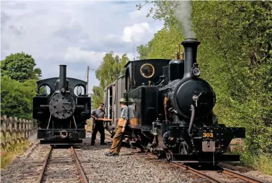  ?? KArl HeAtH ?? capturing the atmosphere of railways on the Western front, newly restored War Office Hunslet no. 1215 (rOd no. 303) poses alongside the leighton buzzard railway-based baldwin 4-6-0pt no. 778 during a 30742 charters photograph­ic event at the apedale Valley light railway on July 16.