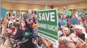  ?? Daily Pilot ?? BANNING RANCH Conservanc­y members urge the Coastal Commission to reject developmen­t plan.