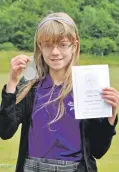  ??  ?? Rona McIntyre, Oigridh Shuaineart learner, won first place with her Gaelic air in the fiddle competitio­n. 21_ F26 Ardnamurch­an MOD 6_ Rona McIntyre