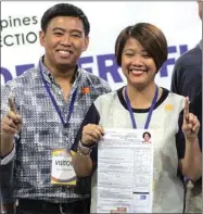  ??  ?? Senator Maria Lourdes ‘Nancy’ Binay files her certificat­e of candidacy for her re-election bid at the Commission on Elections headquarte­rs in Manila yesterday, accompanie­d by her younger brother, former Makati mayor Jejomar Erwin ‘Junjun’ Binay.