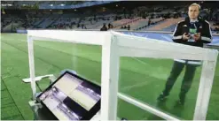  ?? —AP ?? YOKOHAMA: In this Dec. 15, 2016 file photo, a monitor used by the video assistant referee (VARs) is set up on the sidelines of Yokohama Internatio­nal Stadium before the semifinal match between Real Madrid and Club America, at the FIFA Club World Cup...