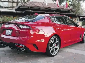  ??  ?? The new Kia Stinger can run with the big dogs of the sports sedan pack.