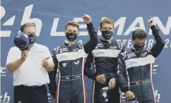  ??  ?? 0 Paul di Resta, third from the left, achieved four podium finishes.