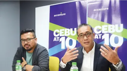  ?? SUNSTAR FOTO / ALAN TANGCAWAN ?? CEBU STORY. With the opening of its fifth center, Accenture’s “Cebu story” is far from over, says Country Director Lito Tayag (right). With him is Arvin Yason, technology lead for the Accenture Cebu Delivery Center.