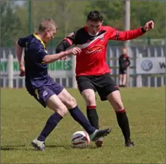  ??  ?? Gearóid Byrne of Rosslare Rangers and Páraic Conway of St. Leonards battle for possession.