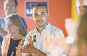  ?? H John Voorhees III / Hearst Connecticu­t Media ?? Raghib Allie-Brennan, a candidate for the state House in the 2nd District, attends an LGBTQ day of action with state Comptrolle­r Kevin Lembo in Bethel on Saturday.