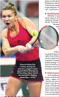  ??  ?? Simona Halep hits a return during her women’s singles match against Maria Sharapova at the China Open tennis tournament in Beijing yesterday. –