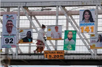  ?? /FOTOS EFE ?? Más de cinco millones de votantes hondureños están convocados a las elecciones generales de este domingo.