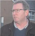  ??  ?? An SAS flag flying in Loughgall and (right) Ulster Unionist MLA Doug Beattie