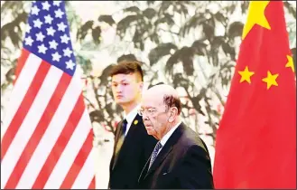  ?? (AFP) ?? US Commerce Secretary Wilbur Ross arrives to the Diaoyutai State Guesthouse to attend a meeting with Chinese
Vice-Premier Liu He in Beijing on June 3.