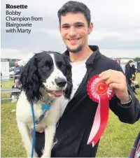  ??  ?? Rosette Bobby Champion from Blairgowri­e with Marty