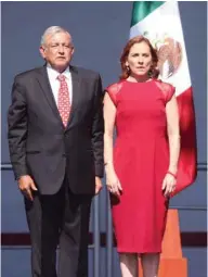  ??  ?? Mexican President Andres Manuel Lopez Obrador, accompanie­d by his wife, Beatriz Gutierrez Muller, attend the anniversar­y of his first year in office at the Zocalo Square in Mexico City, Mexico.