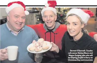  ??  ?? Dermot O’Donnell, Claudes cafe owner Declan Moore and Megan Quigley, who who will be helping people in Derry on Christmas Day