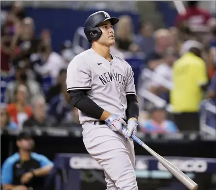  ?? LYNNE SLADKY - THE ASSOCIATED PRESS ?? New York Yankees’ Anthony Rizzo watches after hitting a solo home run during the sixth inning of a baseball game against the Miami Marlins, Friday, July 30, 2021, in Miami.