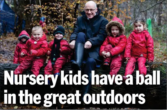  ??  ?? Deputy First Minister John Swinney makes sure he has his welly boots on as he joins the nursery kids in Castlemilk