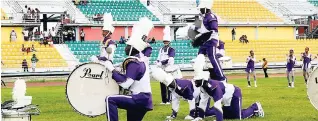  ?? FILE ?? The St Michael Steppers Marching Band performing during the preliminar­y round of the Battle of the Bands Competitio­n in 2010.