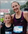  ?? ?? SUPPORT: Paula Radcliffe with her daughter Isla