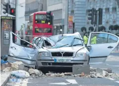  ??  ?? n The wrecked car in which cab driver Julie Sillitoe died.