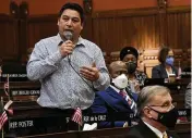  ?? DANA JENSEN / THE DAY ?? Connecticu­t State Representa­tive Joe de la Cruz (D) announces he will not be running for reelection during the opening day of the legislativ­e session Feb. 9 at the State Capitol in Hartford, Conn.