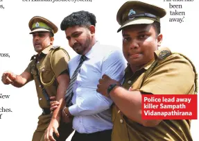  ??  ?? Police lead away killer Sampath Vidanapath­irana