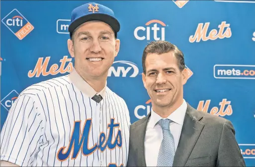  ?? AP ?? WELCOMING PARTY: Brodie Van Wagenen (right), at a press conference for the signing of then-client Todd Frazier in February, will have one of his own at Citi Field on Tuesday when he is introduced as the new general manager of the Mets.