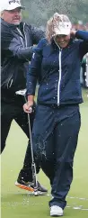  ?? VAUGHN RIDLEY/GETTY IMAGES ?? Brooke Henderson is doused in champagne by dad Dave after winning the CP Women’s Open Sunday in Regina.