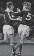  ??  ?? Kenny with Gordon Mcqueen in the dark blue of Scotland