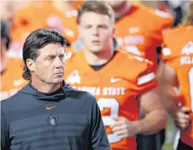  ?? [PHOTO BY SARAH PHIPPS, THE OKLAHOMAN ARCHIVES] ?? Oklahoma State coach Mike Gundy says true freshman running back Jahmyl Jeter has been getting extra work as a backup during bowl practices.