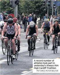  ?? PICTURES: PETER BOLTER ?? A record number of athletes took part in yesterday’s Always Aim High Cardiff Triathlon