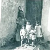  ?? PICTURE: PENELOPE HOLMES ?? A woman in District Six with children in the area.