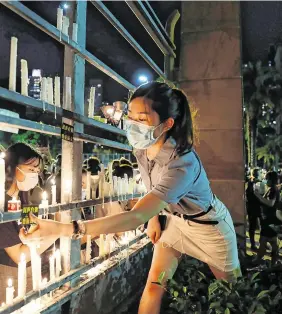  ?? PHOTO: REUTERS ?? Memorial:
A candlelit vigil in Hong Kong to mark the 31st anniversar­y of the crackdown of protests at Beijing’s Tiananmen Square.