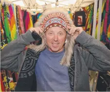  ?? Todd Kimmorley of Currajong tries some headwear. ??