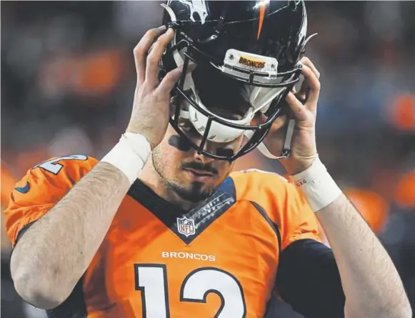  ?? Steve Nehf, The Denver Post ?? Could quarterbac­k Paxton Lynch be the solution to the Broncos’ offensive woes? He received reps with the first and second teams Wednesday.