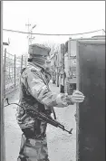  ?? HT ?? ▪ A soldier at the Rashtriya Rifles army camp near Srinagar. No proxy war or insurgency can survive without local support