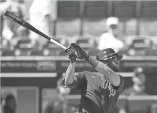  ?? DOUGLAS P. DEFELICE/GETTY IMAGES ?? Willi Castro of the Detroit Tigers hits a solo home run in the first inning against the Pittsburgh Pirates during a spring training game at LECOM Park on Tuesday in Bradenton, Fla.