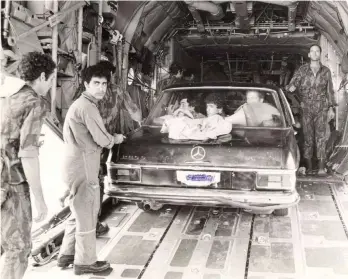  ?? (Mercedes: IDF Spokesman; Amin: Wikimedia Commons) ?? THE FAMOUS black Mercedes resembling that of Ugandan dictator Idi Amin (left), brought along on the rescue aircraft to assist the Israelis in bypassing Entebbe security checkpoint­s.